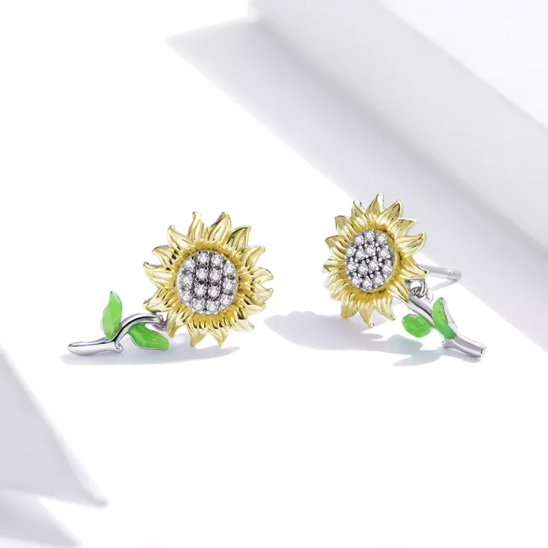 (imagen para) Estos aretes de botón de estilo Pandora en dos tonos bicolor con diseño de giras - Ver 3