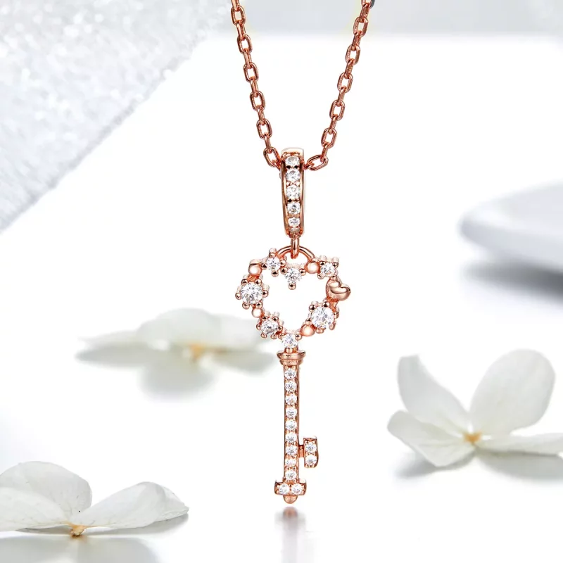 (imagen para) Pendiente estilo Pandora de oro rosa con colgante de llave brillante Luchy - SCC - Ver 3