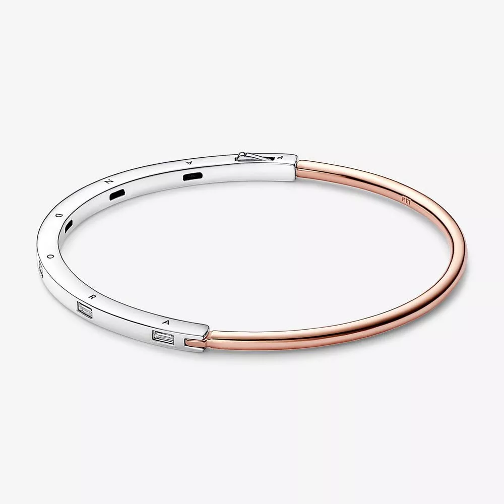 pulsera en dos tonos y gemas pandora signature 582740c01